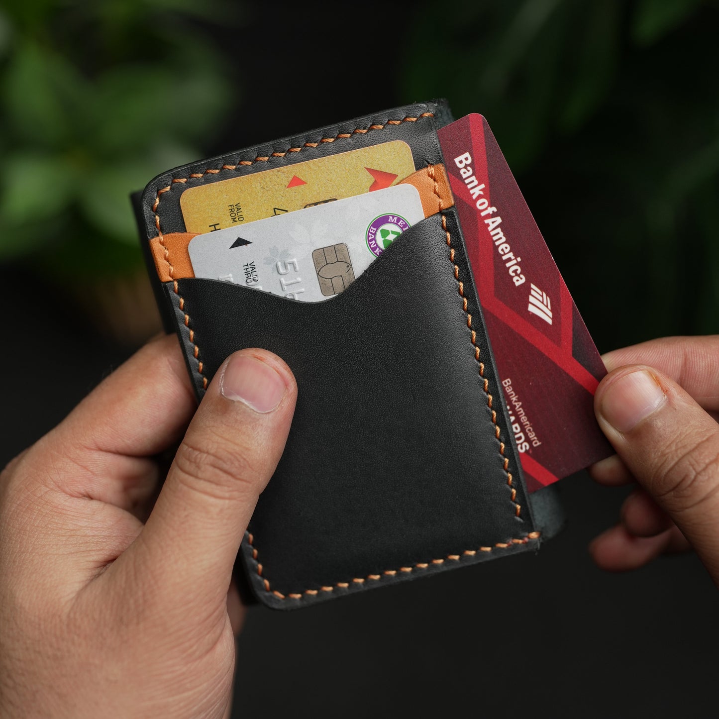 No. 69 vertical bifold wallet Black & Tan color