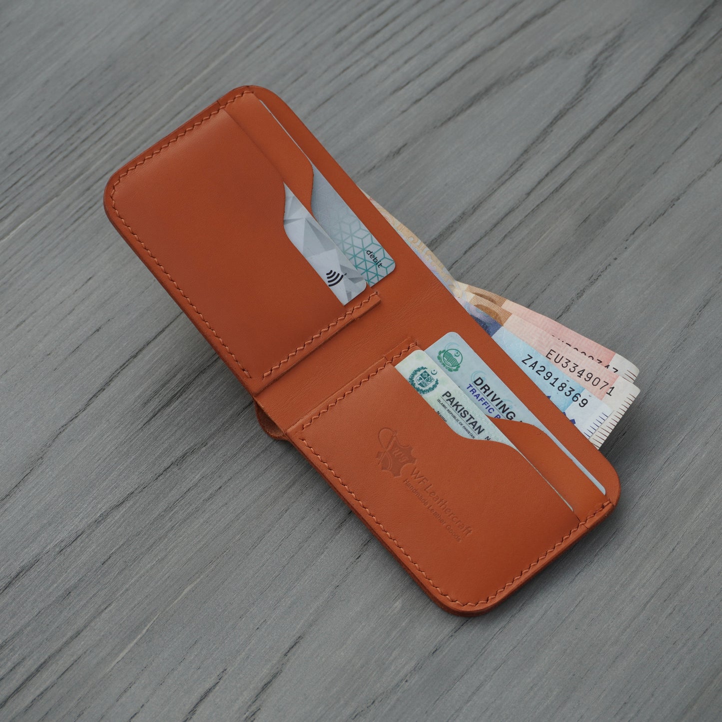 genuine leather wallet price in Pakistan, leather wallets in Pakistan gents wallet leather, smart wallet in Pakistan, leather wallet for men, long wallet for men, bifold leather wallet in Pakistan, long bifold wallet, genuine leather bifold wallet, best bifold wallet,handmade leather wallets in pakistan