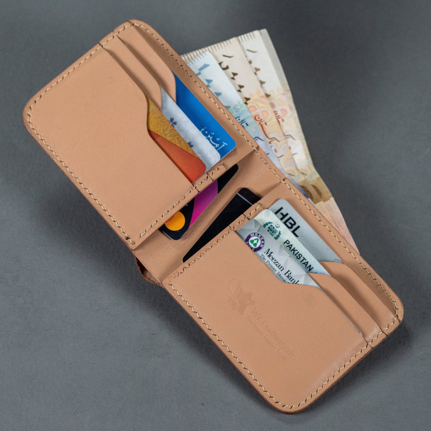 genuine leather wallet price in Pakistan, leather wallets in Pakistan gents wallet leather, smart wallet in Pakistan, leather wallet for men, long wallet for men, bifold leather wallet in Pakistan, long bifold wallet, genuine leather bifold wallet, best bifold wallet,handmade leather wallets in pakistan